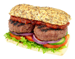 Double quarter pounder beefburger and salad sandwich isolated on a white background