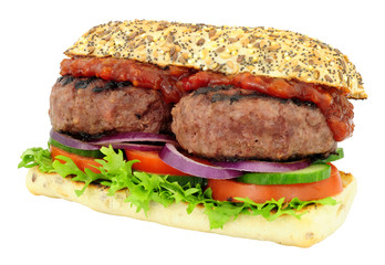 Double quarter pounder beefburger and salad sandwich isolated on a white background