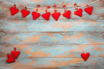 Red hearts on wooden background. Top view with copy space