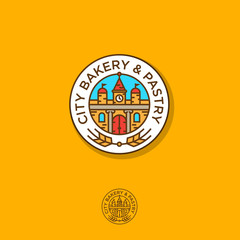 Bakery logo. Pastry logo. The building and ears are a round emblem. Towers, clocks, roofs and gates.