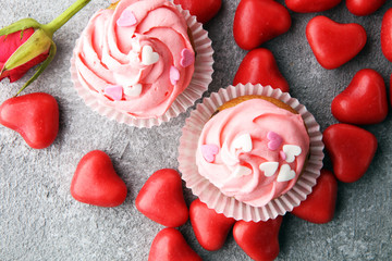 Delicious cupcake for Valentine Day. cake for Valentines day with chocolate and strawberries. Traditional homemade with red roses