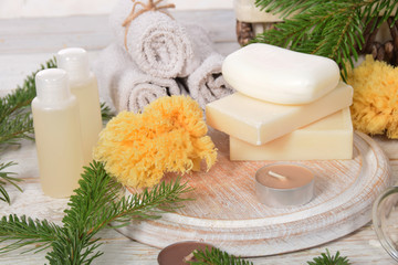 natural body soap and hot bath on a winter evening with a free space for text
