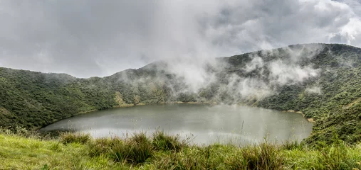 Fototapeten Lake inside Bisoke volcano crater, Virunga volcano national park, Rwanda © vadim.nefedov