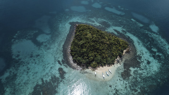 High angle scenic view of island amidst sea