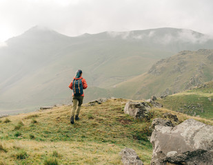 Fototapeta premium Hiker woman walking in the mountains.
