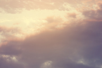 Sky background or texture at the sunset time with clouds. Copy space. Instagram