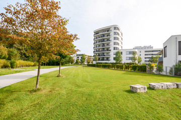 Fototapeta premium Modern apartment buildings in a green residential area in the city
