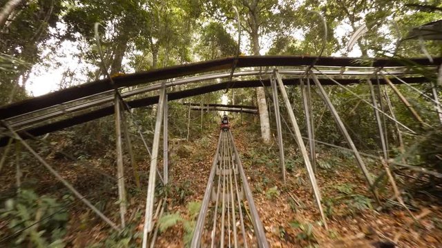 Slide Rail System Carries Tourists up Mountain at Datanla Waterfall