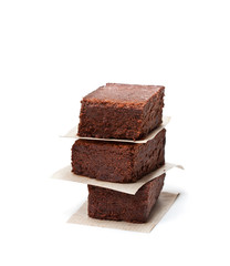 Chocolate  brownie pieces isolated on white
