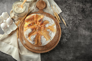 Loaf of wheat bread on table. Fresh from oven