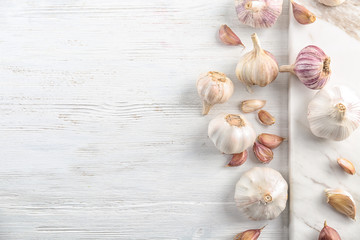 Fresh garlic on wooden table