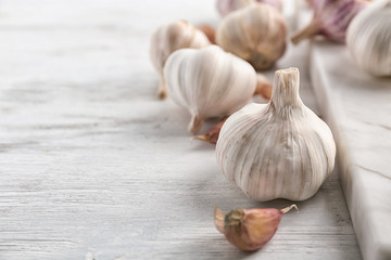 Fresh garlic on wooden table