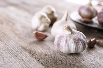 Fresh garlic on wooden table