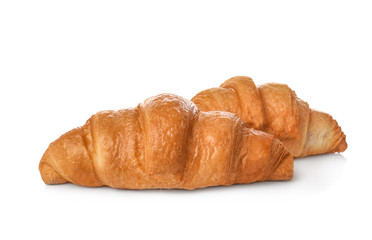 Tasty croissants on white background