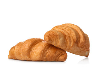 Fototapeta premium Tasty croissants on white background