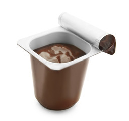 Plastic cup with chocolate yogurt on white background