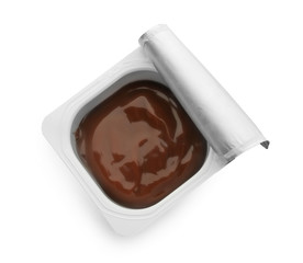 Plastic cup with chocolate yogurt on white background