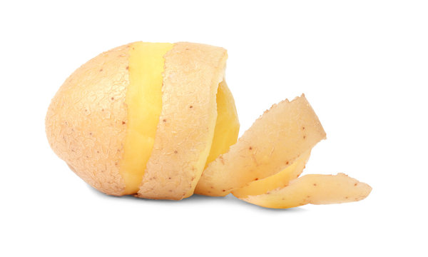 Raw peeled potato with skin on white background