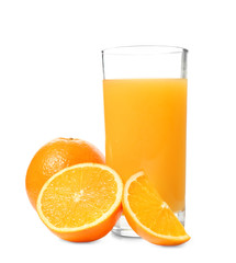 Glass of fresh orange juice with fruit on white background