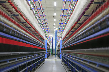 The modern spinning machine works in the workshop