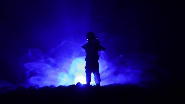 Army sniper with large-caliber sniper rifle seeking killing enemy. Silhouette on sky background. National security ensured, servicemen on guard. Battle scene