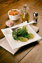 Cooked and seasoned spinach on the plate