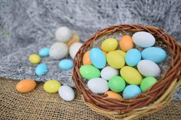 chocolate eggs of various colors with decorations