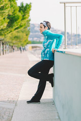 Attractive woman stretching before Fitness and Exercise. Beautiful smiling young athlete woman working out. Fitness concept