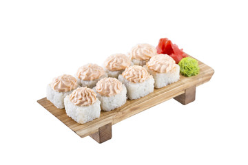 Sushi set on a wooden board on a white background.Isolated.