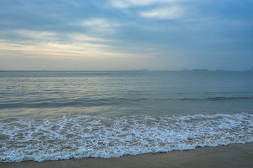 coast of china, at low tide the beach with sunset