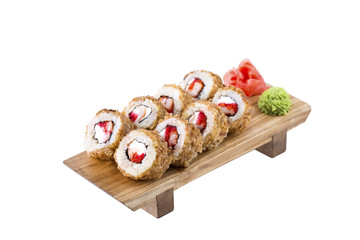 Sushi set on a wooden board on a white background.Isolated.