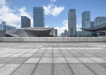 Fototapeta premium cityscape and skyline in blue sky from empty floor