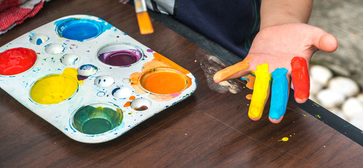 Paint and brushes with  close up view.