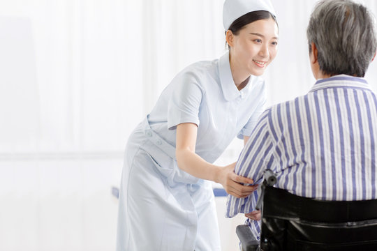 Nurses care for sick older people