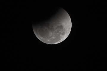 A lunar eclipse occurs when the Moon passes directly behind the Earth