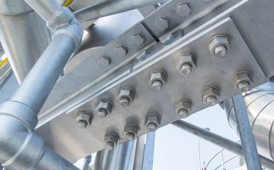 Joint of steel structure with bolt and nut at construction site