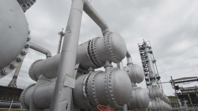 Fuel Tanks Connected by Pipeline against Smoke Tower