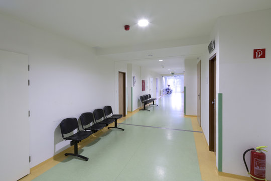 Empty Hospital Corridor With Green Floor