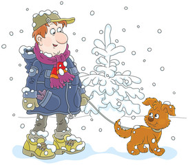 Naklejka premium Winter walk with a dog. A man wearing warm clothes and walking over snow with his funny pup, a vector illustration in cartoon style