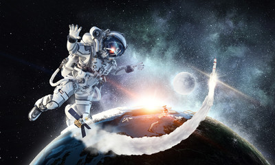 Fototapeta na wymiar Spaceman and his mission. Mixed media