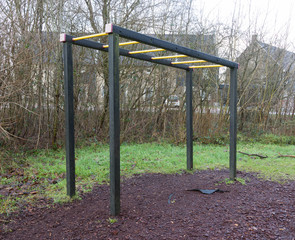 Fototapeta na wymiar Fitness equipment in a forest - One stage of many