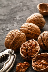 Walnuts  on dark stone  background. Healthy food concept