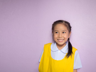 Portrait of Asian happy little girl , smile, school uniform