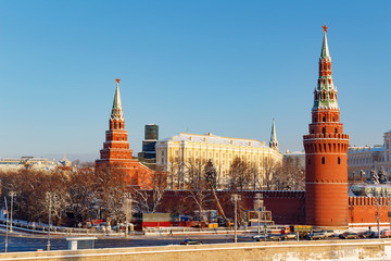 Fortress wall and Moscow Kremlin towers at sunny winter day. Views from the Bol'shoy Kamennyy Bridge