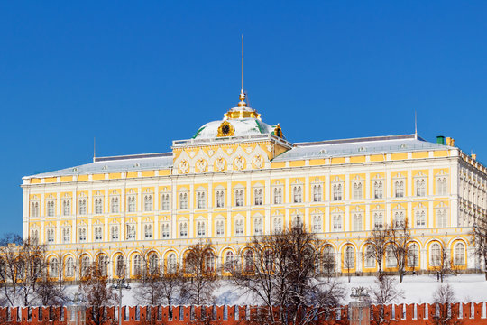 Grand Kremlin Palace against blue sky at sunny winter day. Moscow in winter