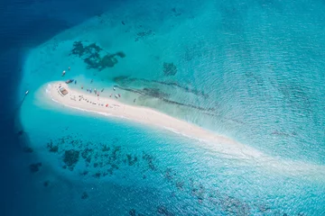 Afwasbaar Fotobehang Zanzibar Aerial view of beautiful sand tropical island with white sand beach and tourists, Zanzibar