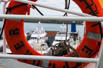Yachts loaded up onto a transport ship ready to be shipped across the atlantic to Florida.