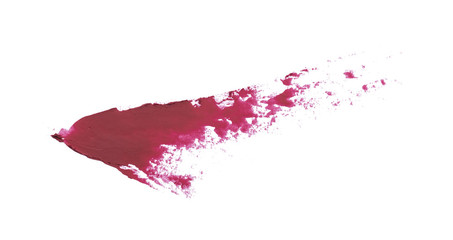 Red color lipstick paint in random shape on background