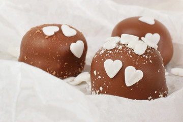 Pralines with heart shape confetties