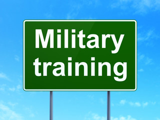 Studying concept: Military Training on green road highway sign, clear blue sky background, 3D rendering